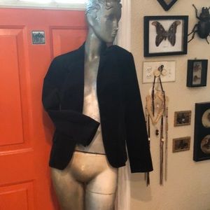 Thin corduroy black jacket.